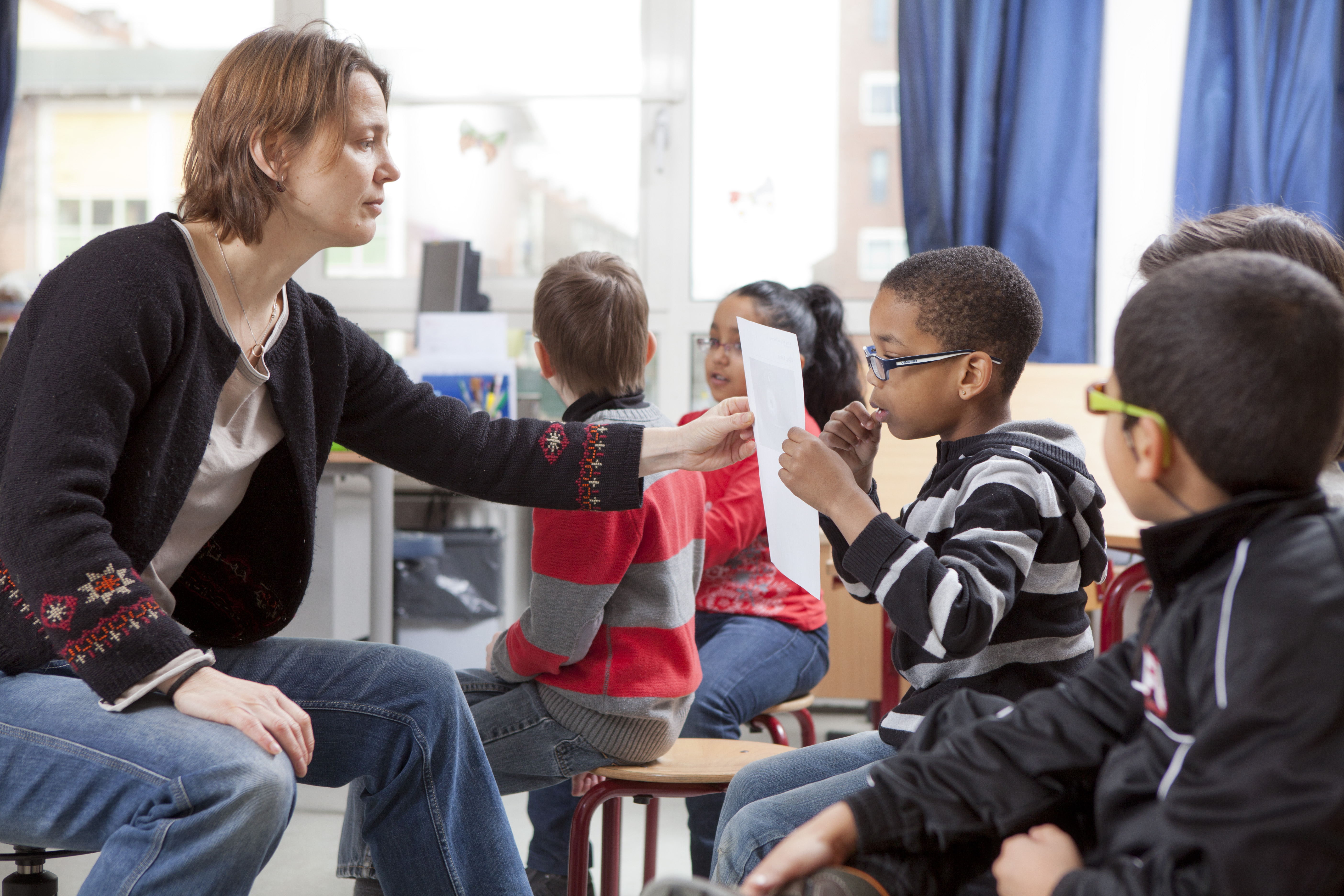 visio-onderwijs-amsterdam-kring-met-docent.jpg