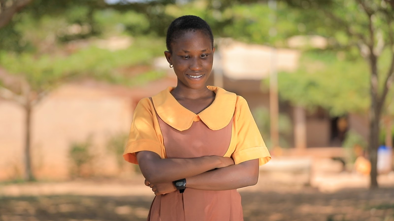 Woman in Ghana with armes crossed